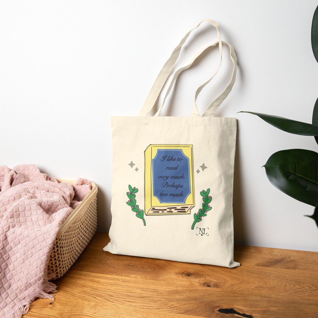 Book Lover Cotton Canvas Tote Bag — "I like to read very much. Perhaps too much." Graphic