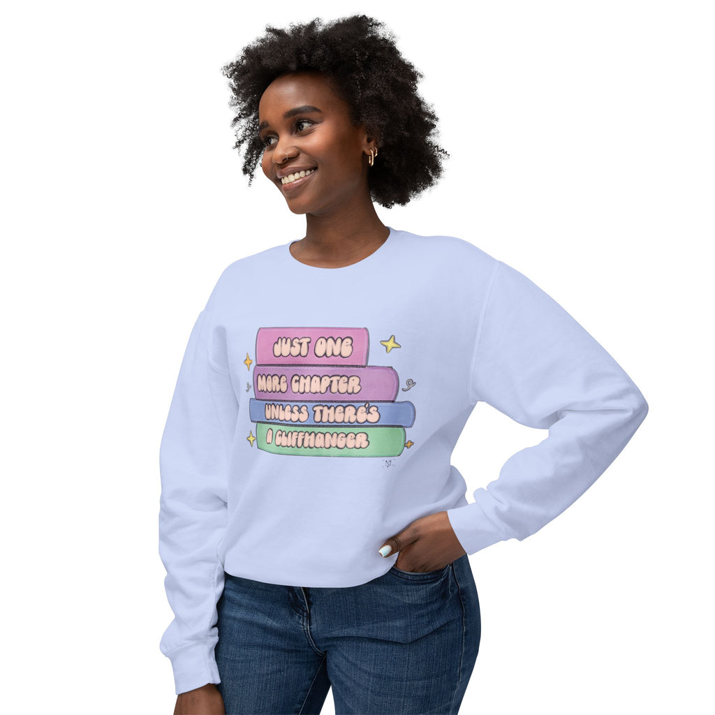 Cozy Book Lover Crewneck Sweatshirt — "Just One More Chapter Unless There’s a Cliffhanger."