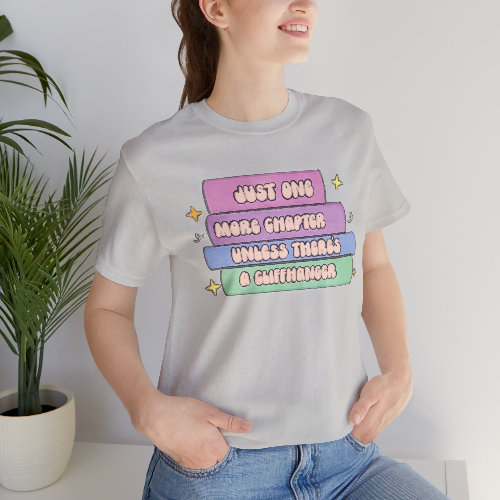Book Lover Tee — "Just One More Chapter Unless There’s A Cliffhanger" Pastel Graphic