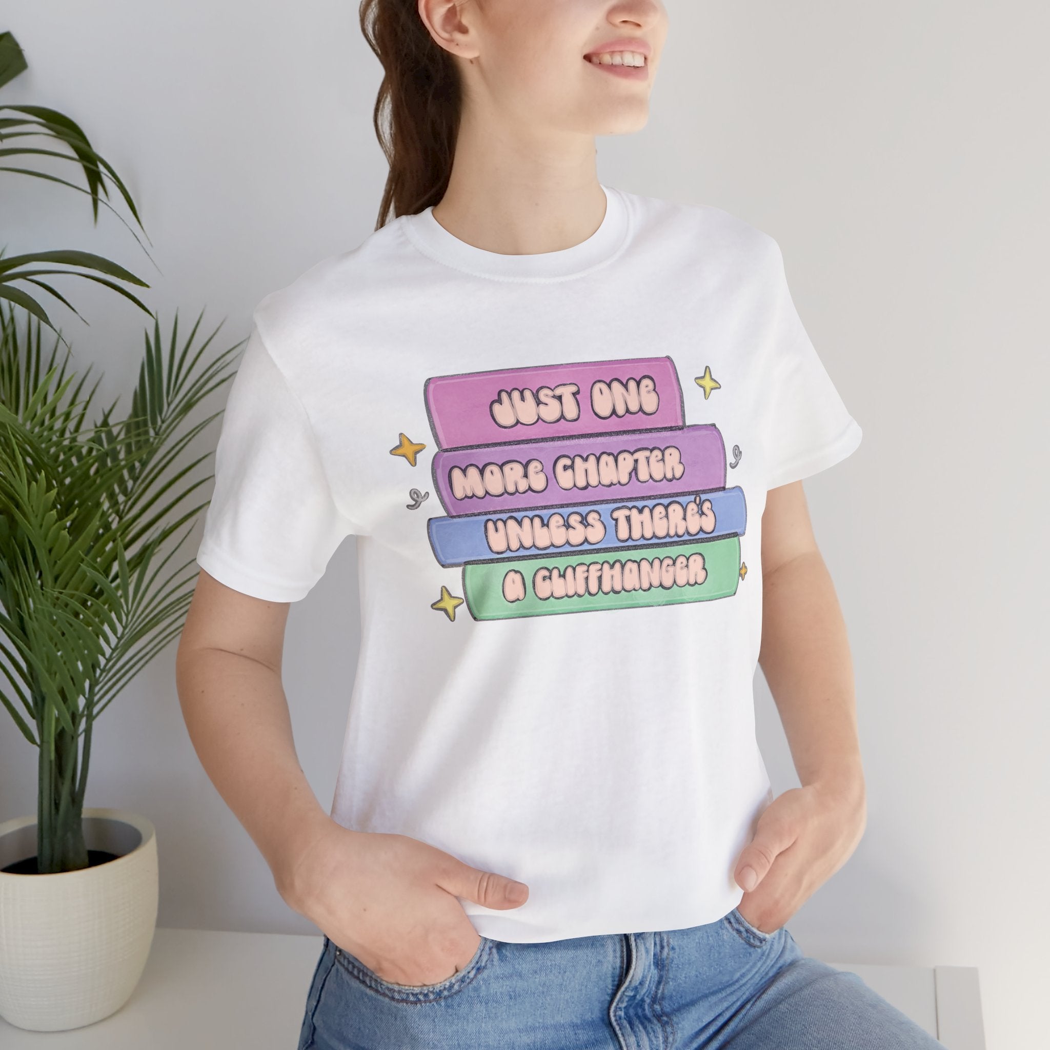 Book Lover Tee — "Just One More Chapter Unless There’s A Cliffhanger" Pastel Graphic