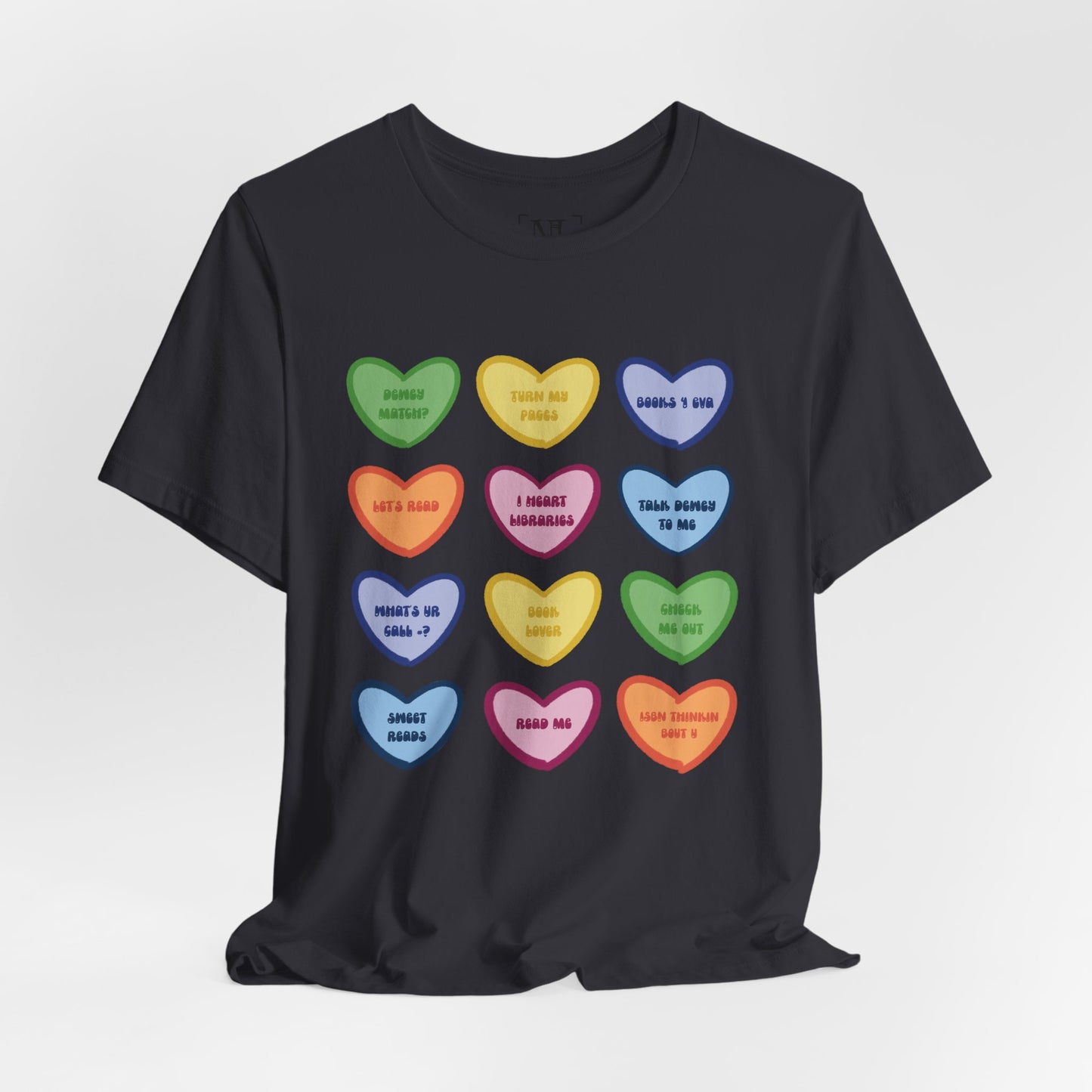 Library Conversation Heart Graphic Tee — Cute Pastel Candy Hearts with Messages