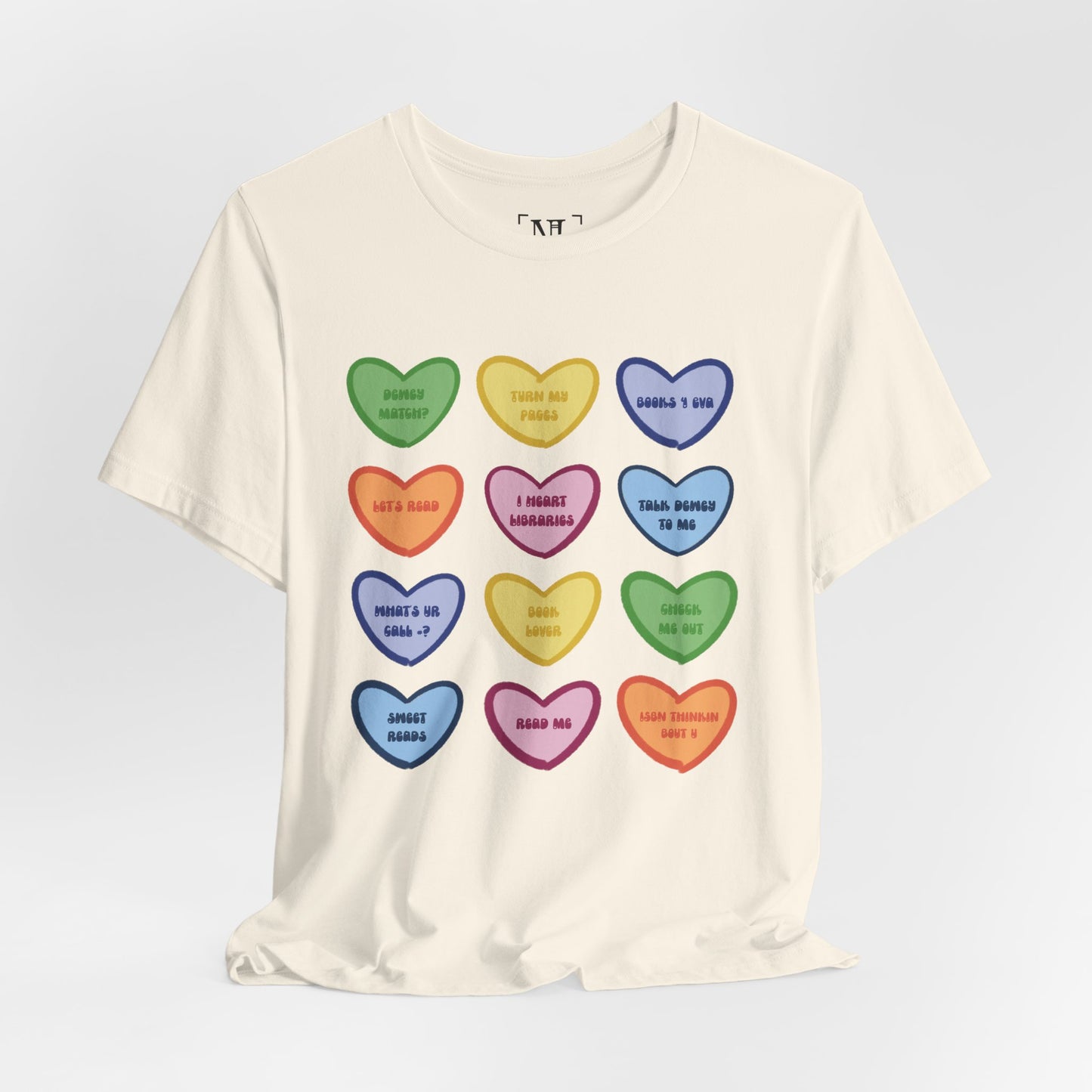 Library Conversation Heart Graphic Tee — Cute Pastel Candy Hearts with Messages