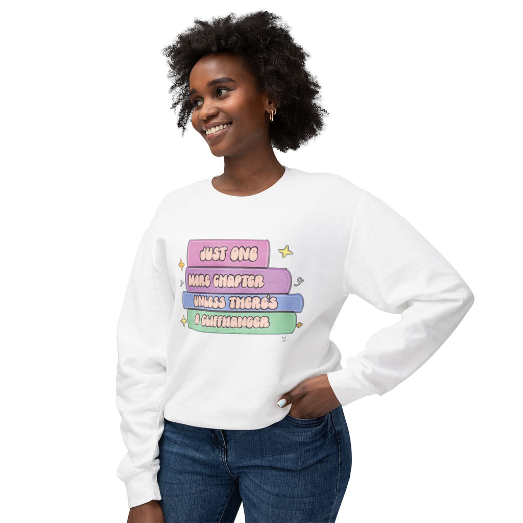Cozy Book Lover Crewneck Sweatshirt — "Just One More Chapter Unless There’s a Cliffhanger."