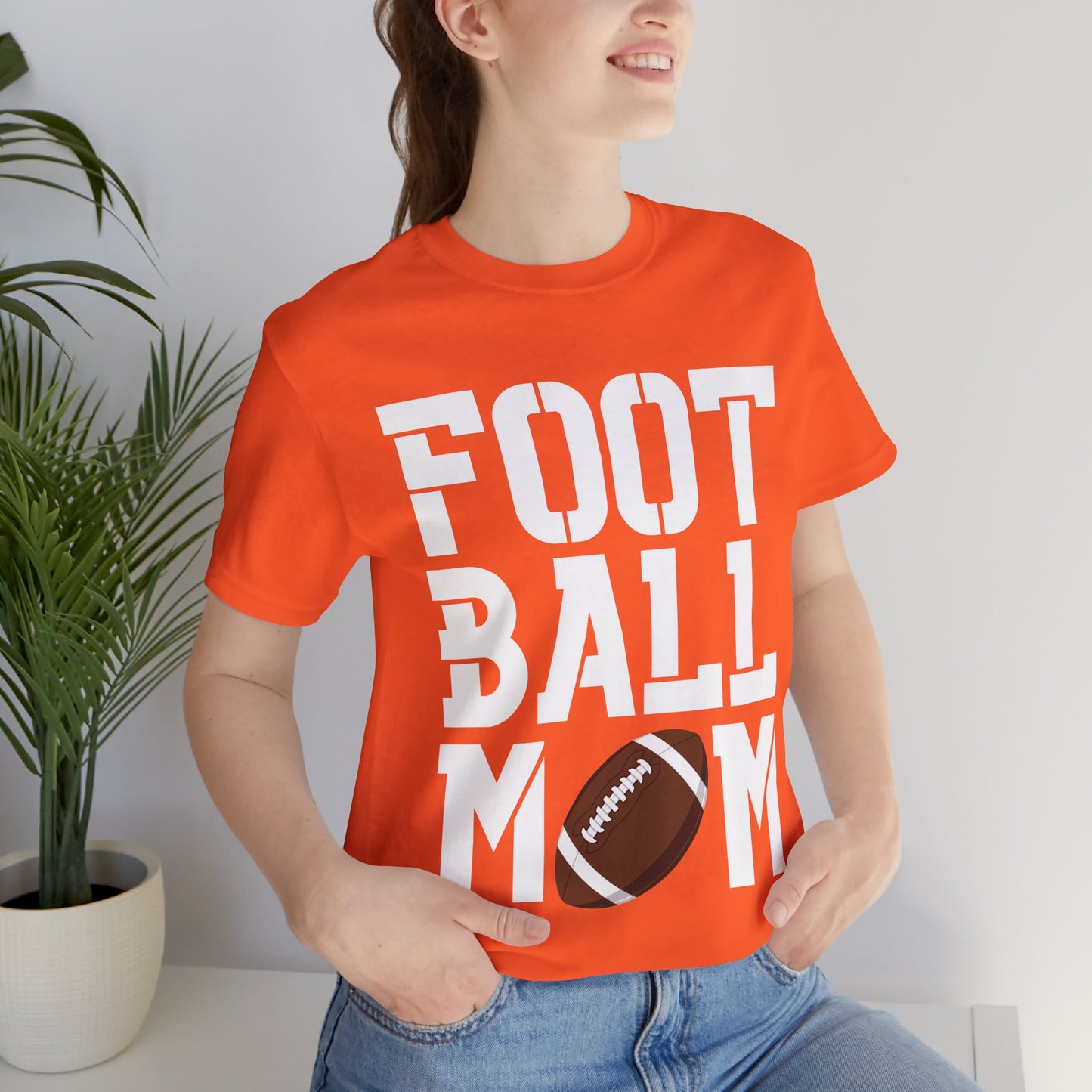 Football Mom T-Shirt – Bold Stacked Text with Football Graphic (White Text)