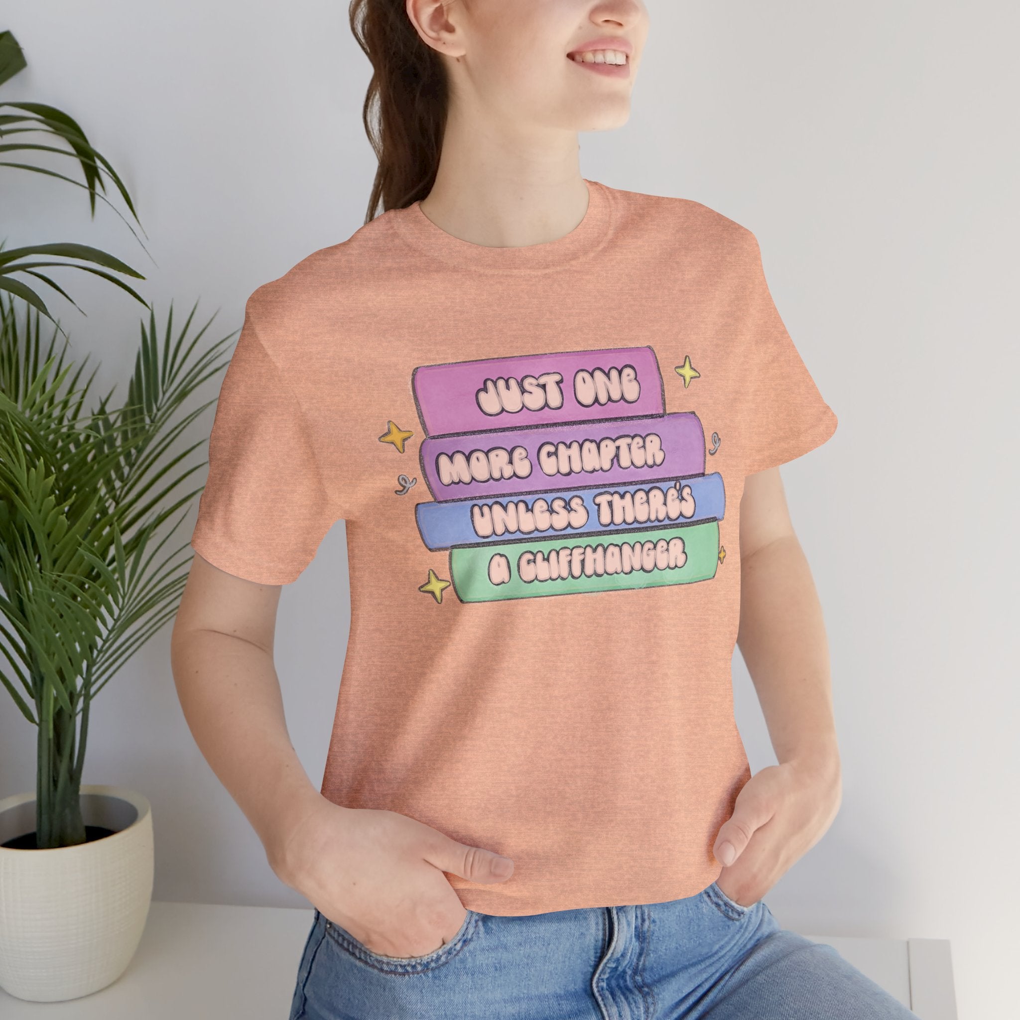 Book Lover Tee — "Just One More Chapter Unless There’s A Cliffhanger" Pastel Graphic