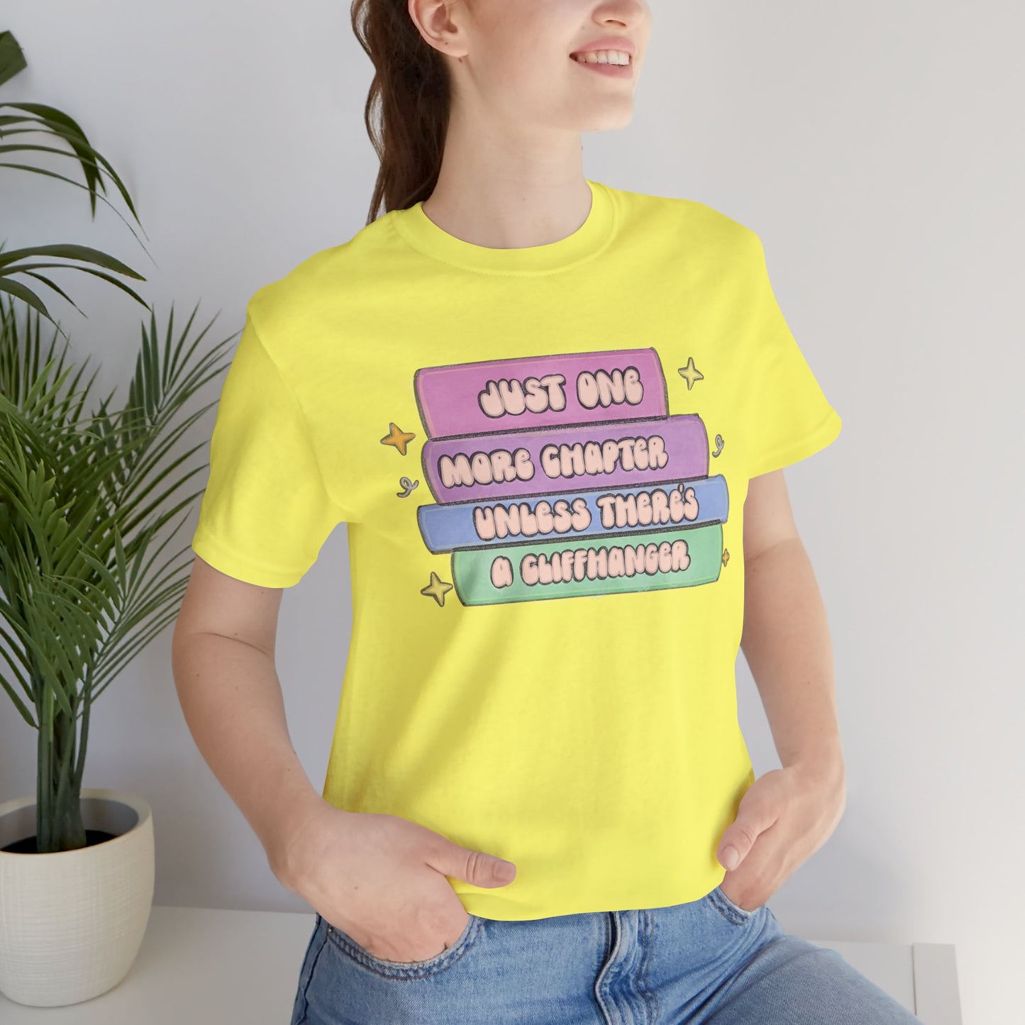 Book Lover Tee — "Just One More Chapter Unless There’s A Cliffhanger" Pastel Graphic
