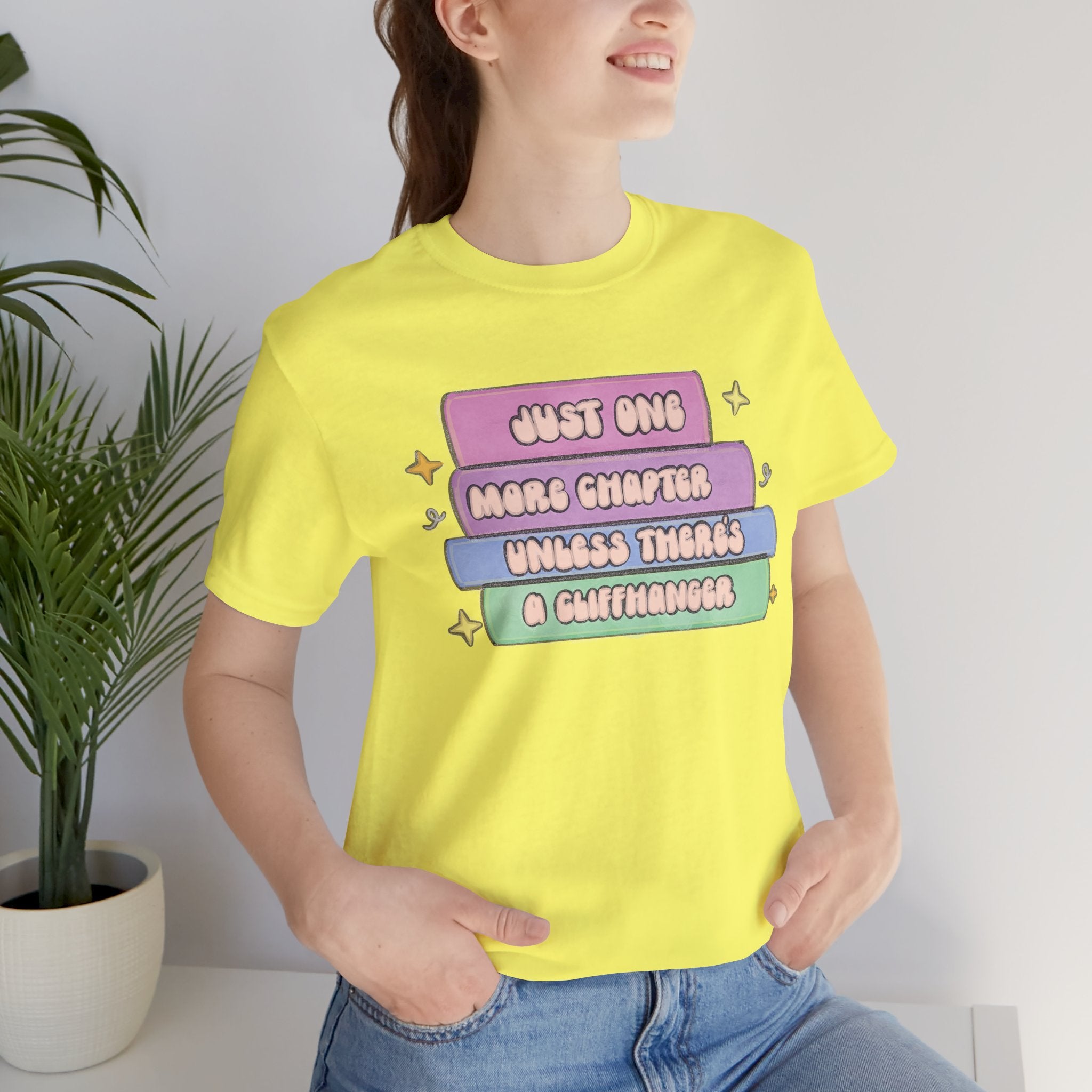 Book Lover Tee — "Just One More Chapter Unless There’s A Cliffhanger" Pastel Graphic