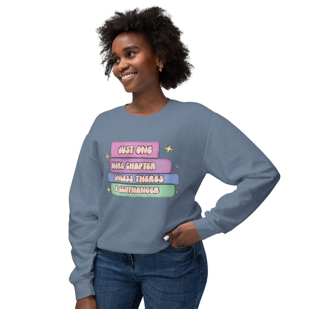 Cozy Book Lover Crewneck Sweatshirt — "Just One More Chapter Unless There’s a Cliffhanger."