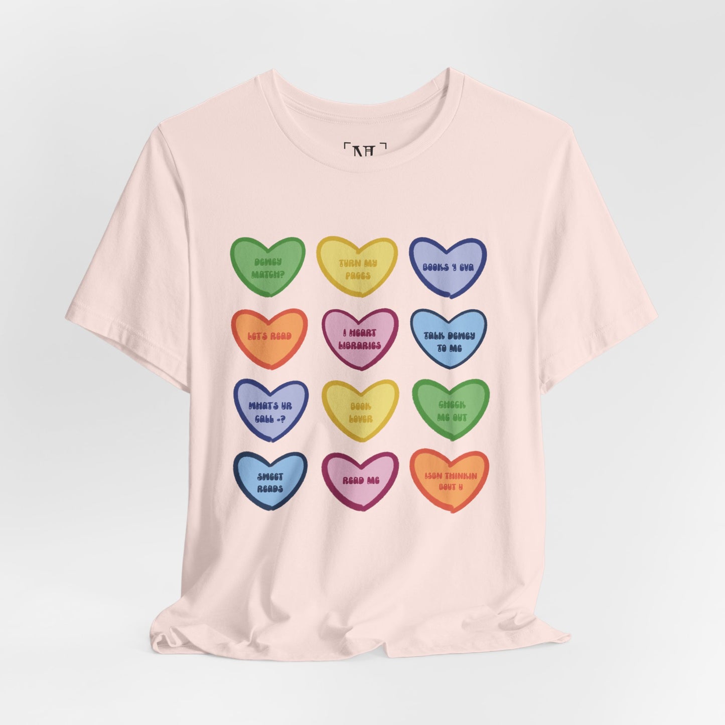 Library Conversation Heart Graphic Tee — Cute Pastel Candy Hearts with Messages